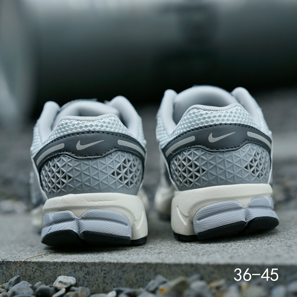 Light Gray and Navy Nike Air Zoom Vomero 5 Sneakers - product image from the listing.