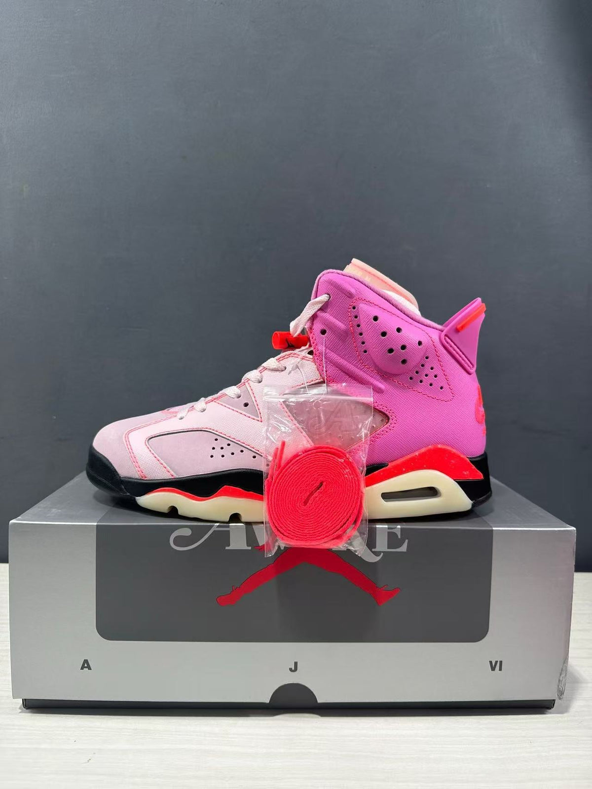 Jordan x Awake NY Air Jordan 6 Retro SP Sneakers in Pink IQ5706-600 - product image from the listing.
