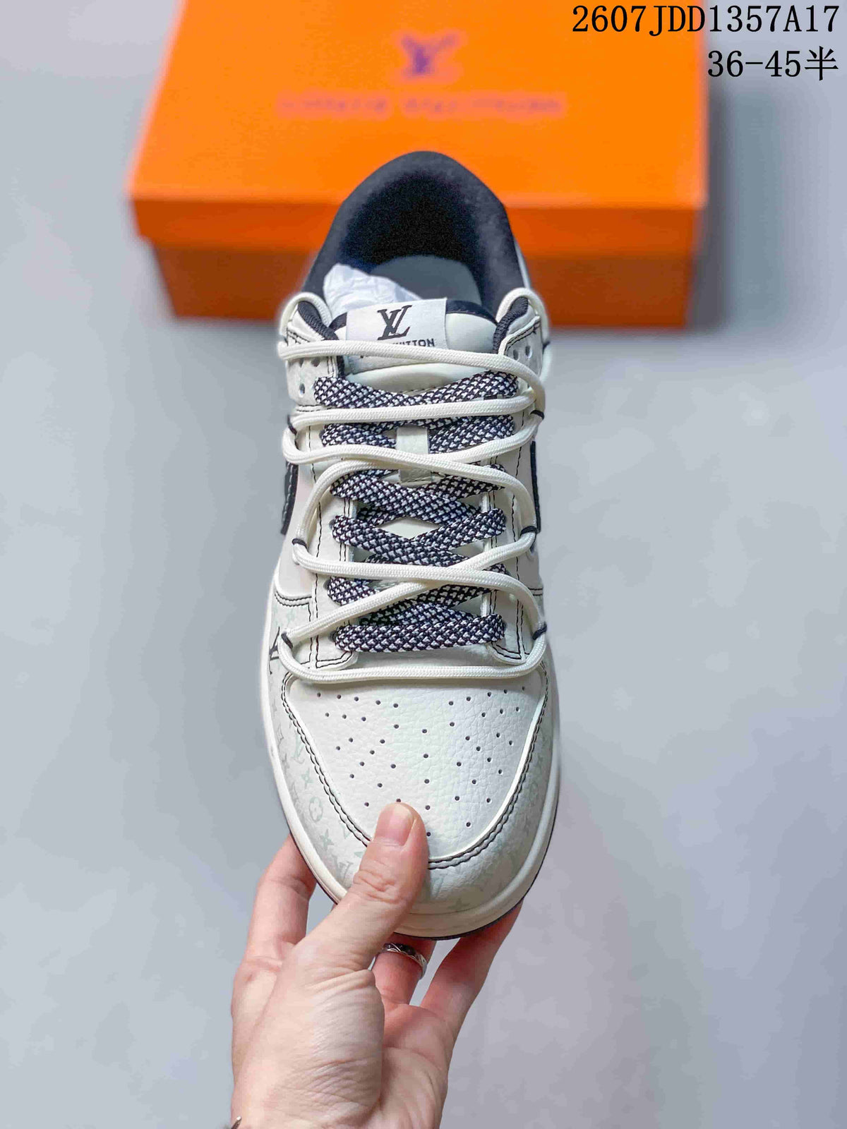 Nike SB Dunk Low White Black Double-Strap Trainers - product image from the listing.