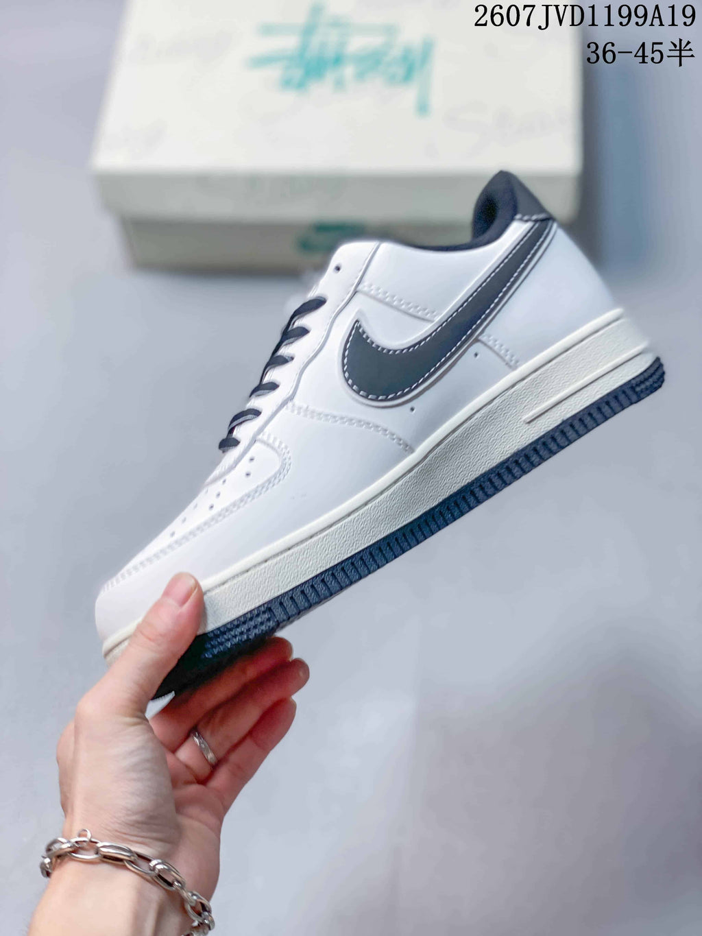 Nike Air Force 1 Low in White Black 2607JVD1199A19 - product image from the listing.