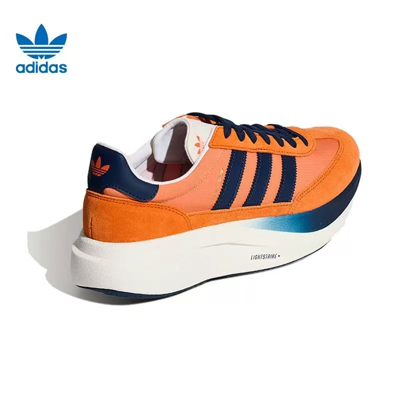 adidas Lightstrike Sneakers in Orange and Navy - product image from the listing.