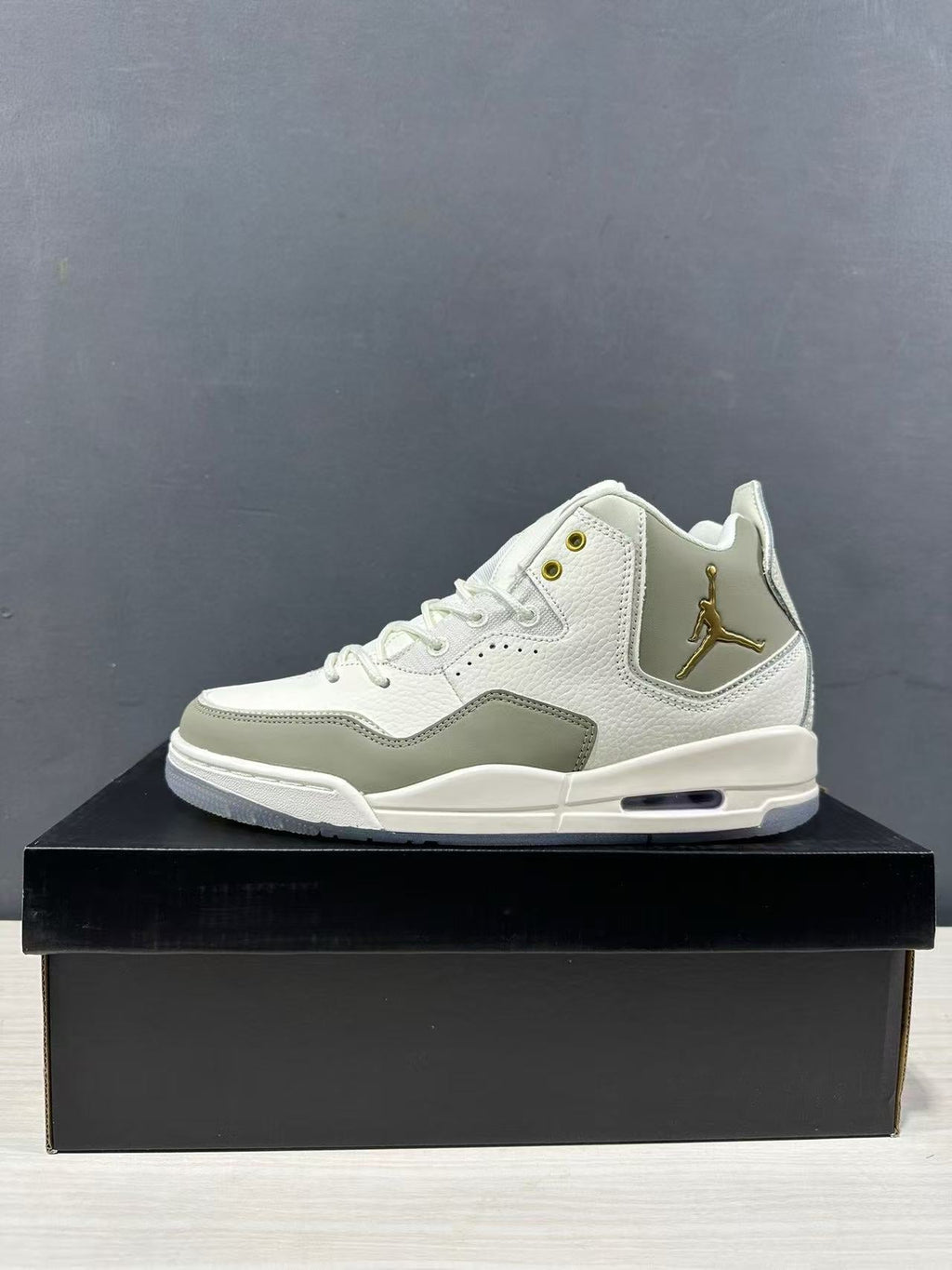 Jordan Courtside 23 High-Cut Sneakers Off-White/Tan IQ9783-171 - product image from the listing.
