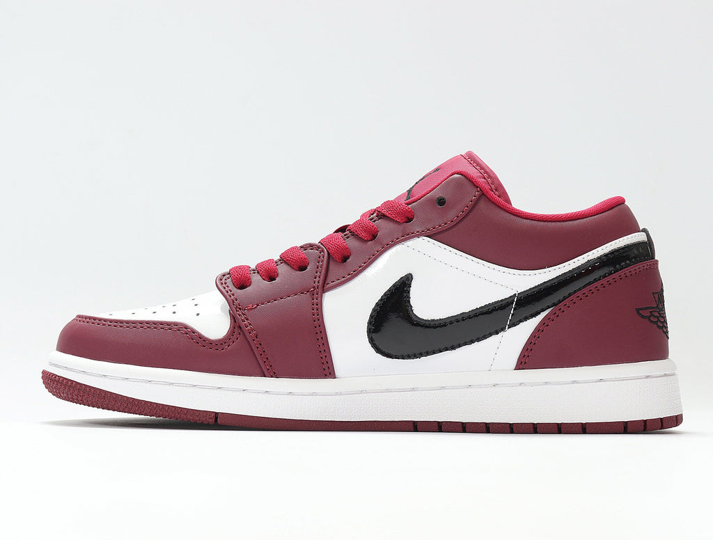 Jordan 1 Low White and Rose Sneakers in Red 553558-604 - product image from the listing.