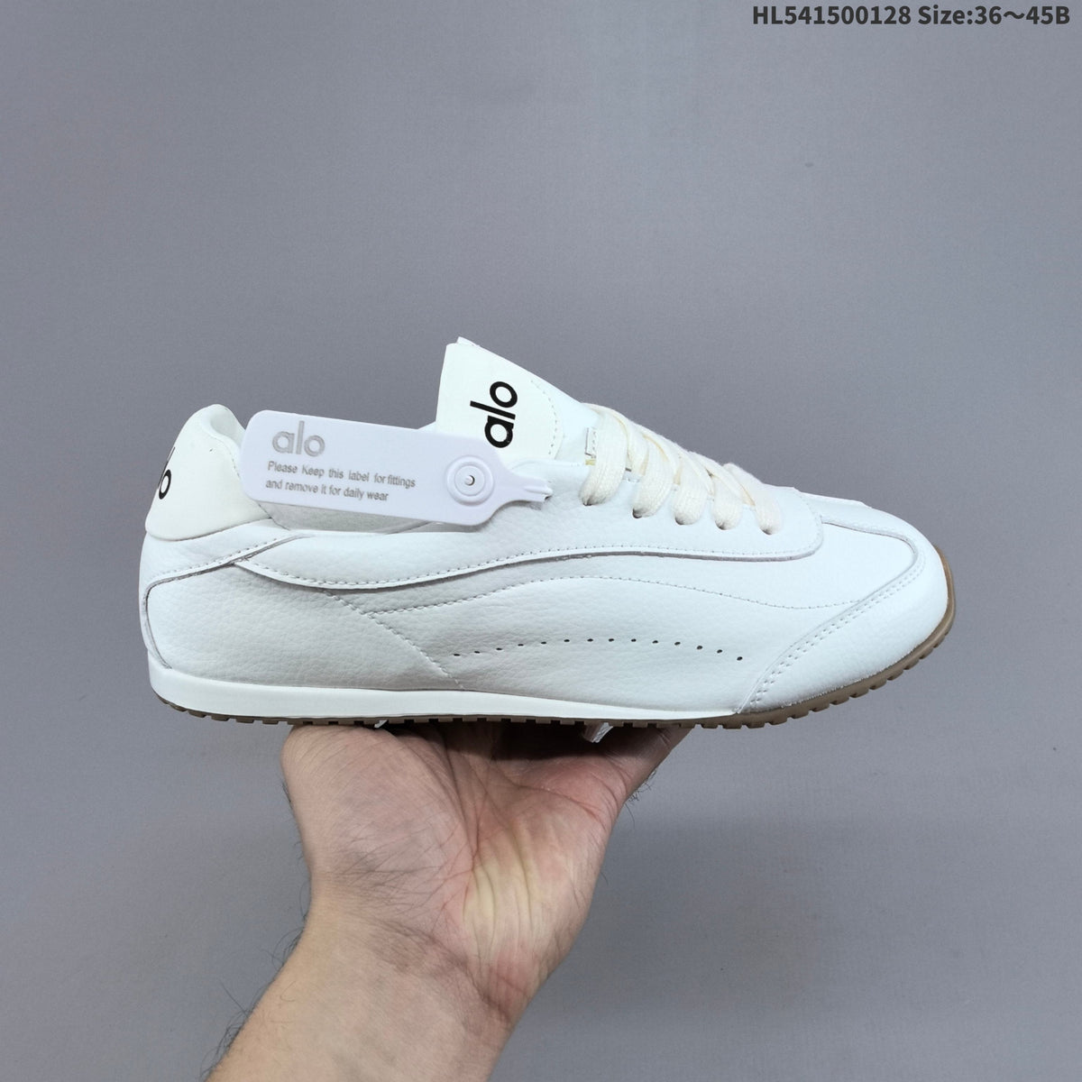 White and Black Alo Yoga Sunset Sneaker Low-Top - product image from the listing.
