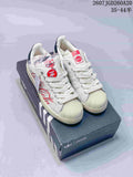 Adidas Superstar x Coca-Cola Low-Top Sneakers in White KH6892 - product image from the listing.