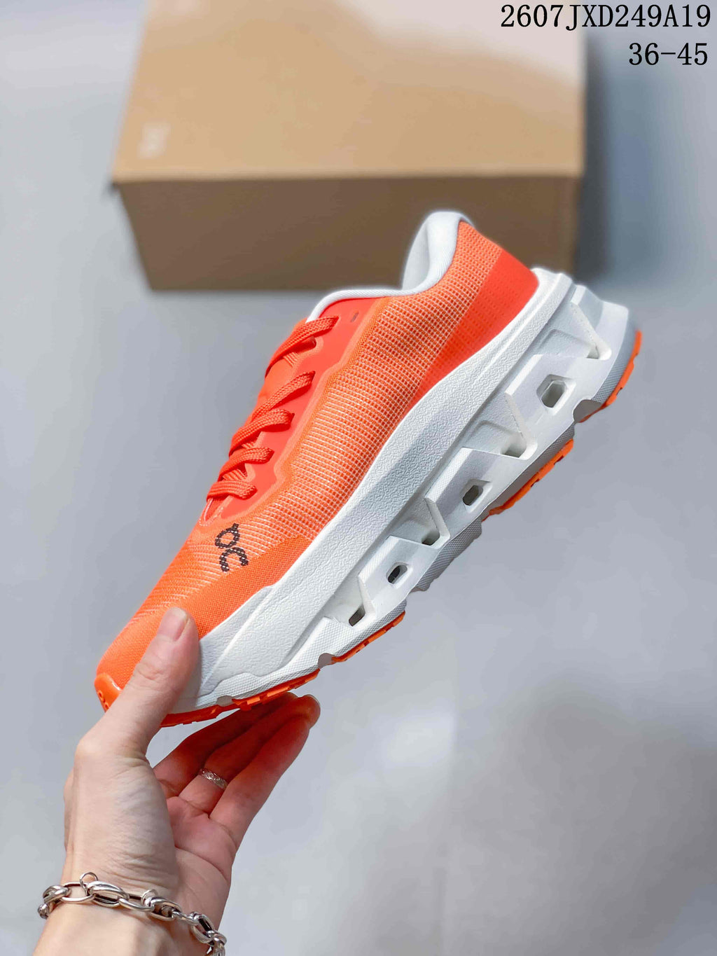 ON Cloudmonster 3 Hyper Sneakers in Orange 711490EEU - product image from the listing.