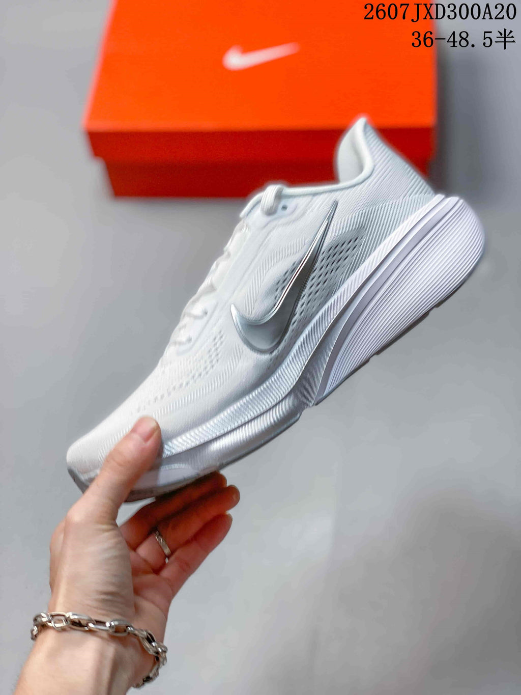 Nike Air Zoom Pegasus 42 Running Sneakers in White JXD300A20 - product image from the listing.