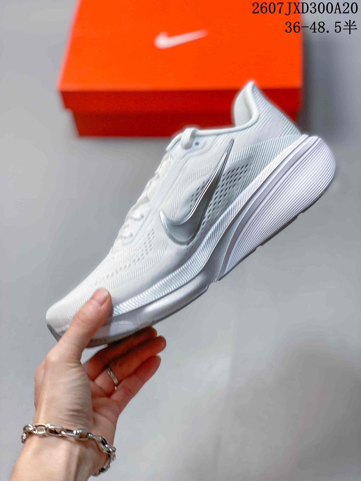 Nike Air Zoom Pegasus 42 Running Sneakers in White JXD300A20 - product image from the listing.
