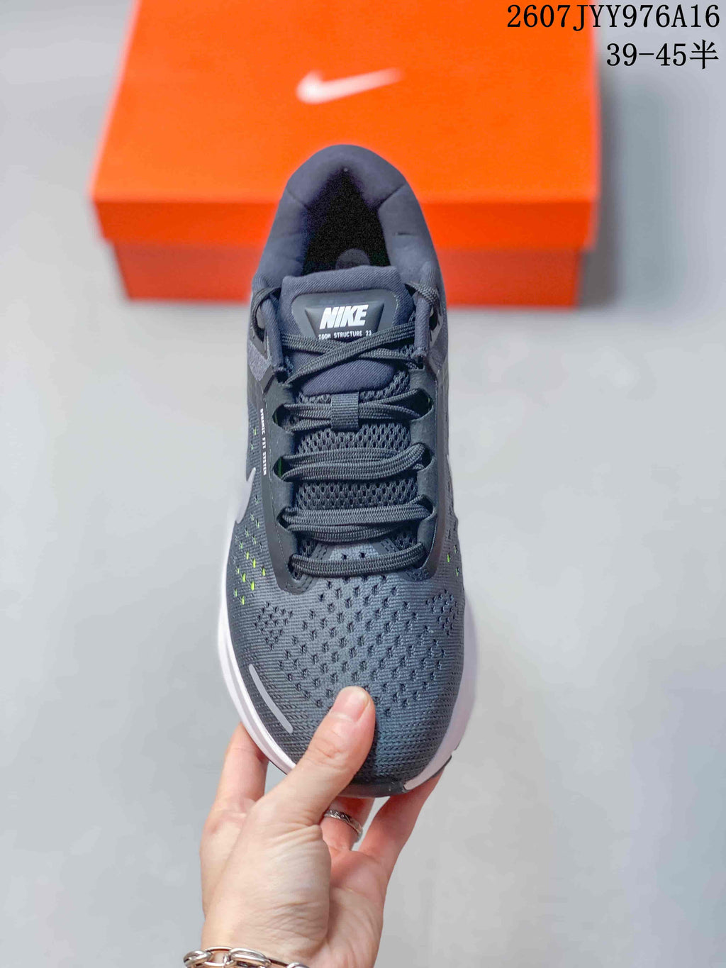 Nike Zoom Structure 23 Running Sneakers in Gray White - product image from the listing.