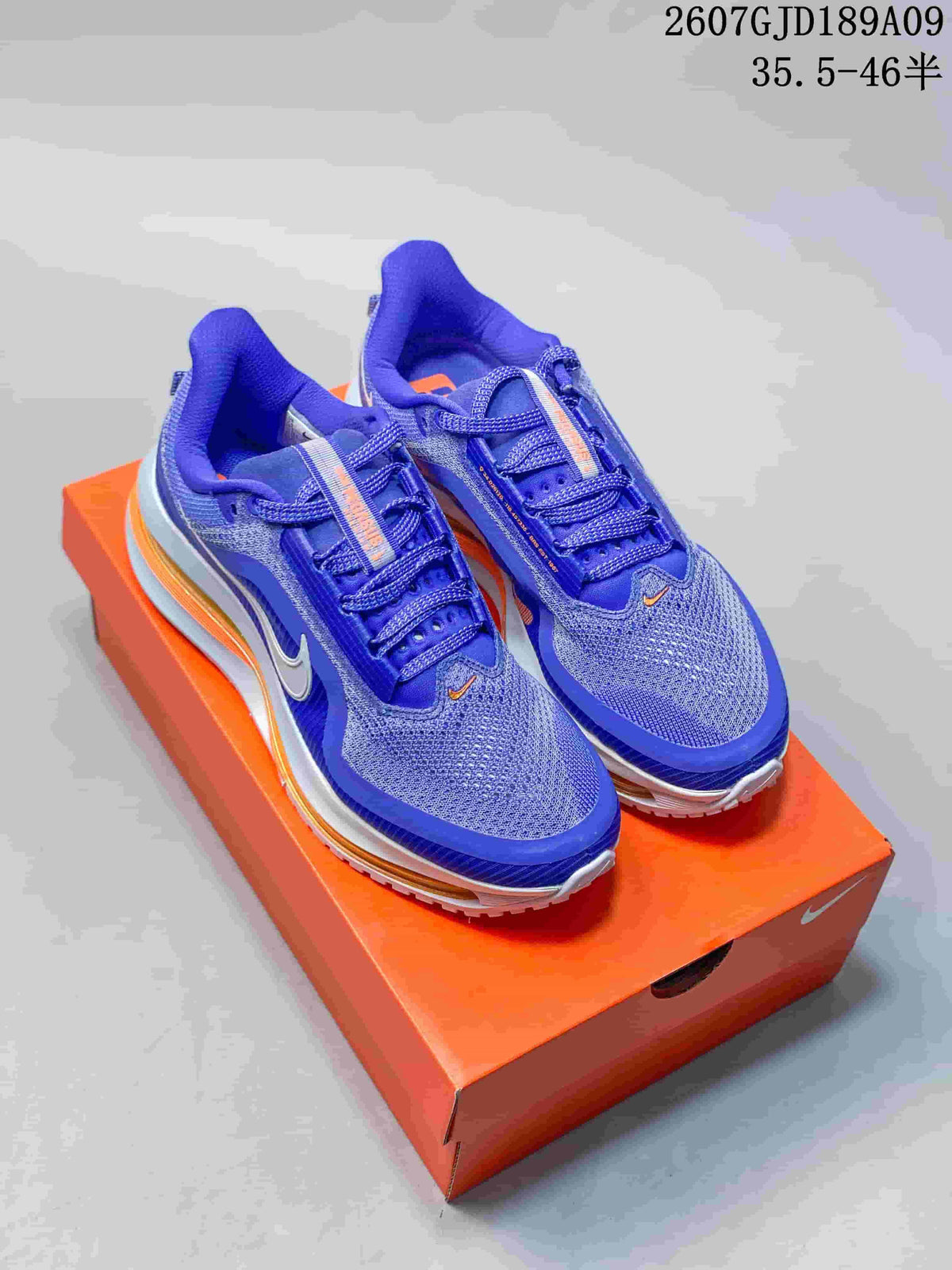 Nike Vomero Premium Running Shoes in Blue - product image from the listing.