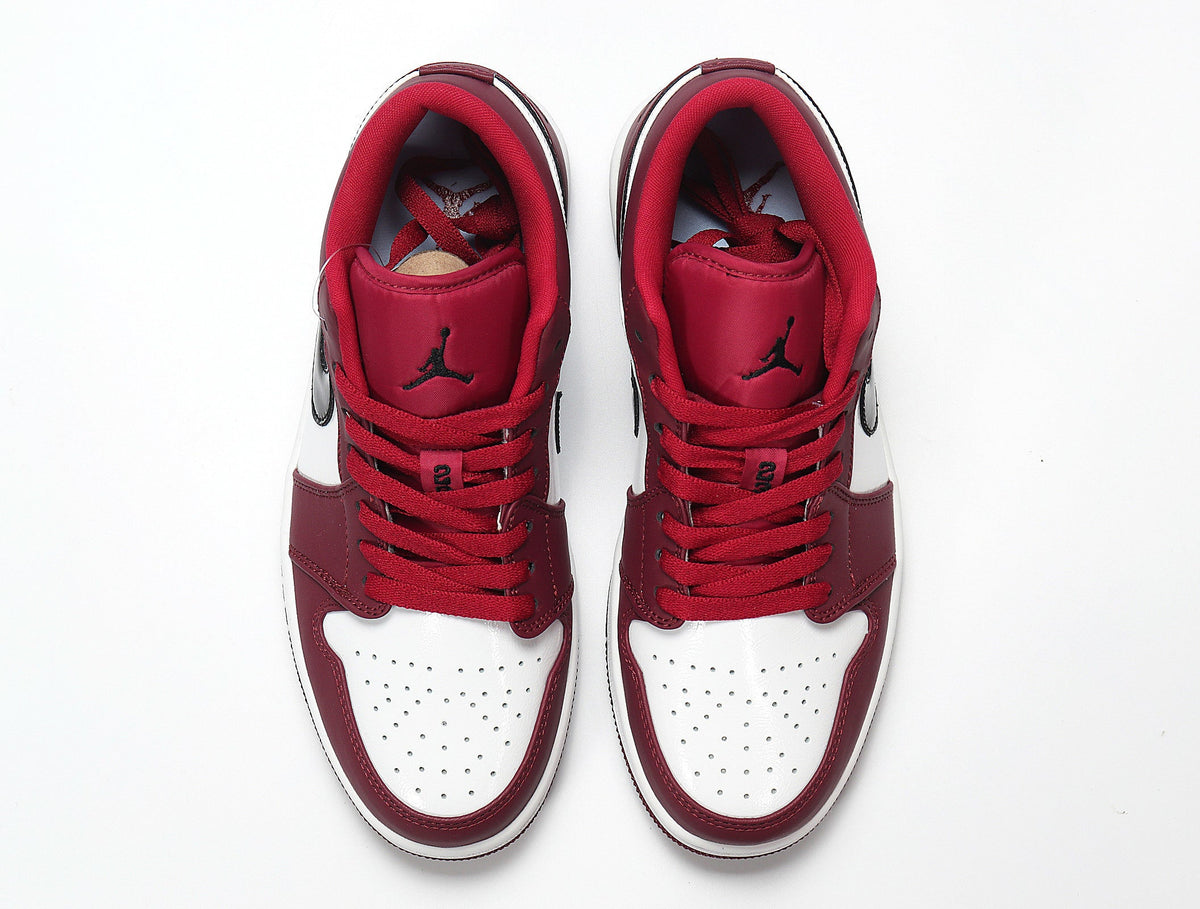 Air Jordan 1 Low Sneakers in Red and White 553558-604 - product image from the listing.