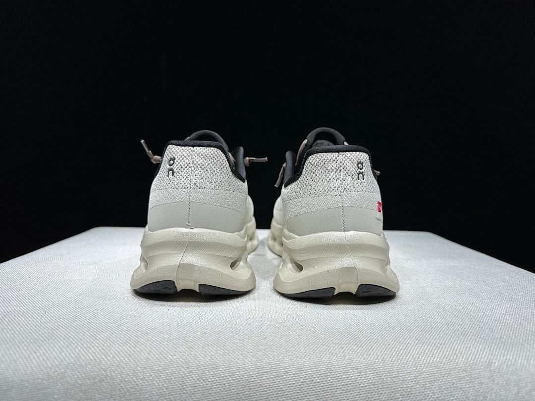 On Cloudtilt Sneakers, in Light Gray and Black - product image from the listing.