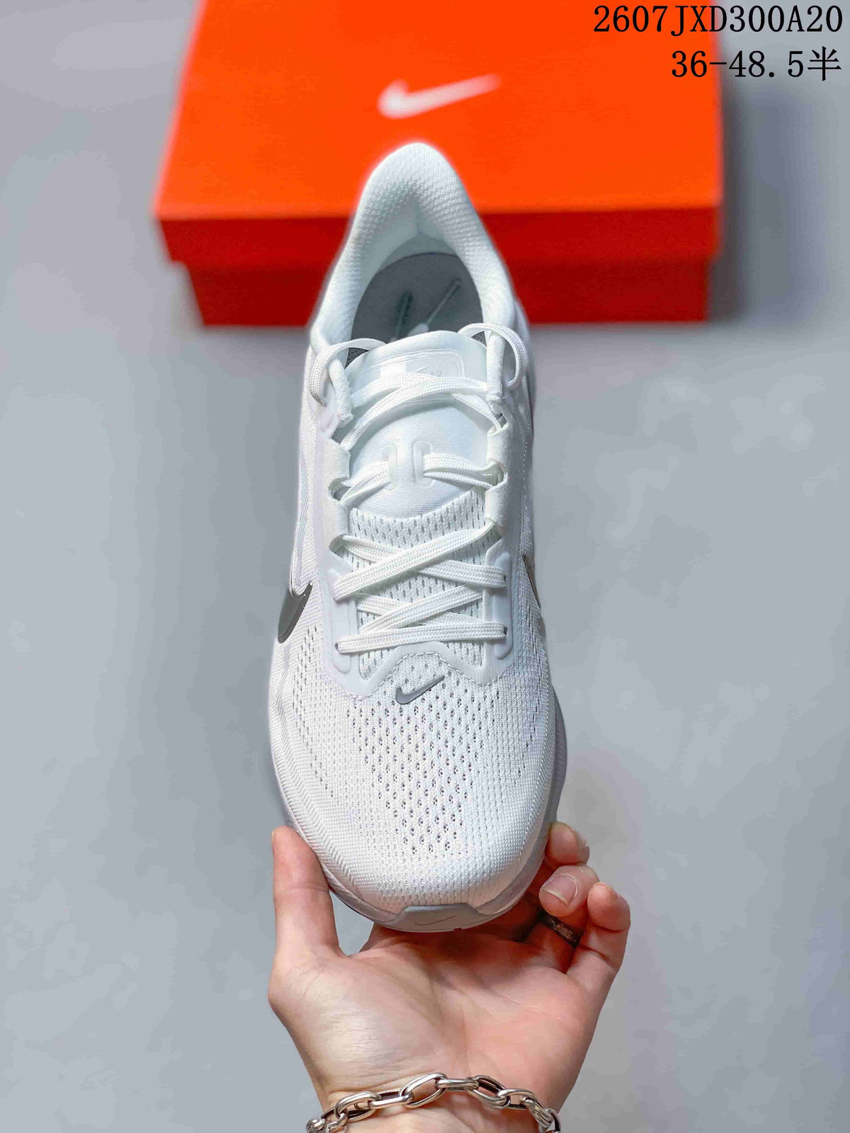 Nike Air Zoom Pegasus 42 Running Sneakers in White JXD300A20 - product image from the listing.