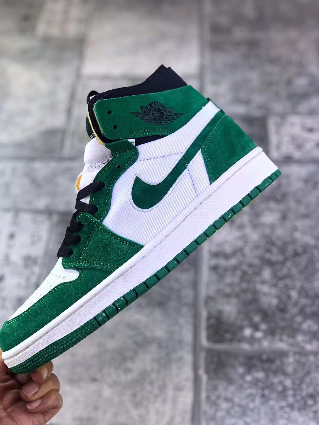 Jordan 1 Zoom CMFT Sneakers in Green White CT0978-300 - product image from the listing.