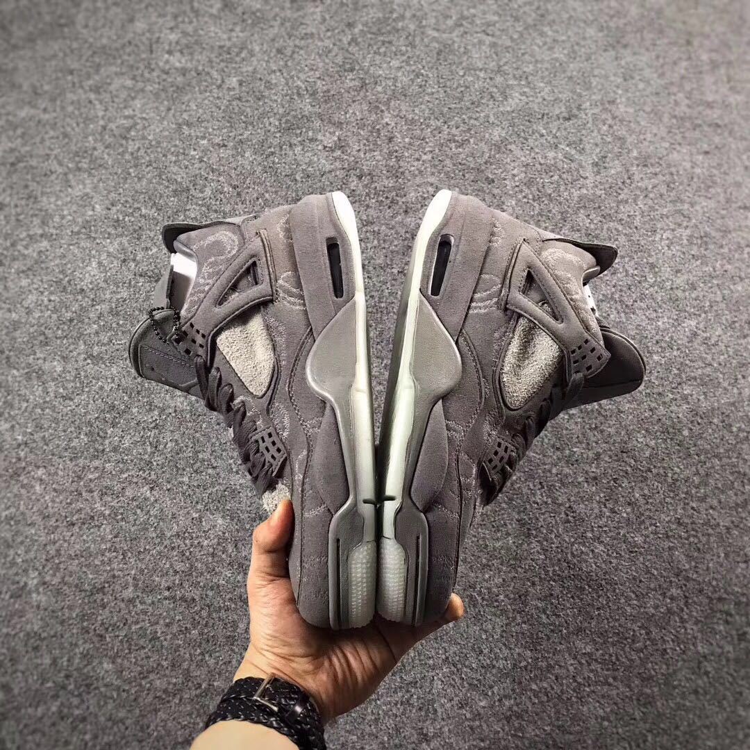Grey Jordan 4 KAWS Sample High-Top Sneakers - product image from the listing.