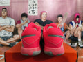 Nike Basketball Shoes in Red and Gray - product image from the listing.