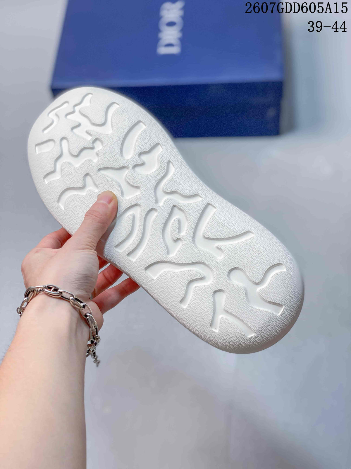 Dior Low-Top Sneakers in White and Blue 2607GDD605A15 - product image from the listing.