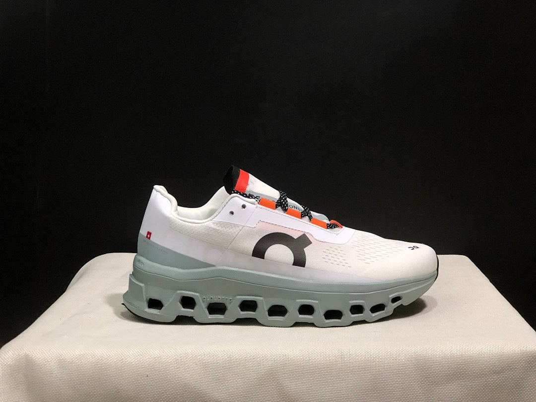 White and Blue On Cloudmonster Sneakers - product image from the listing.