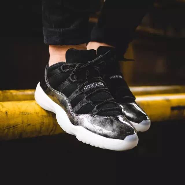 Jordan 11 Retro Low Barons Sneakers in Black White - product image from the listing.