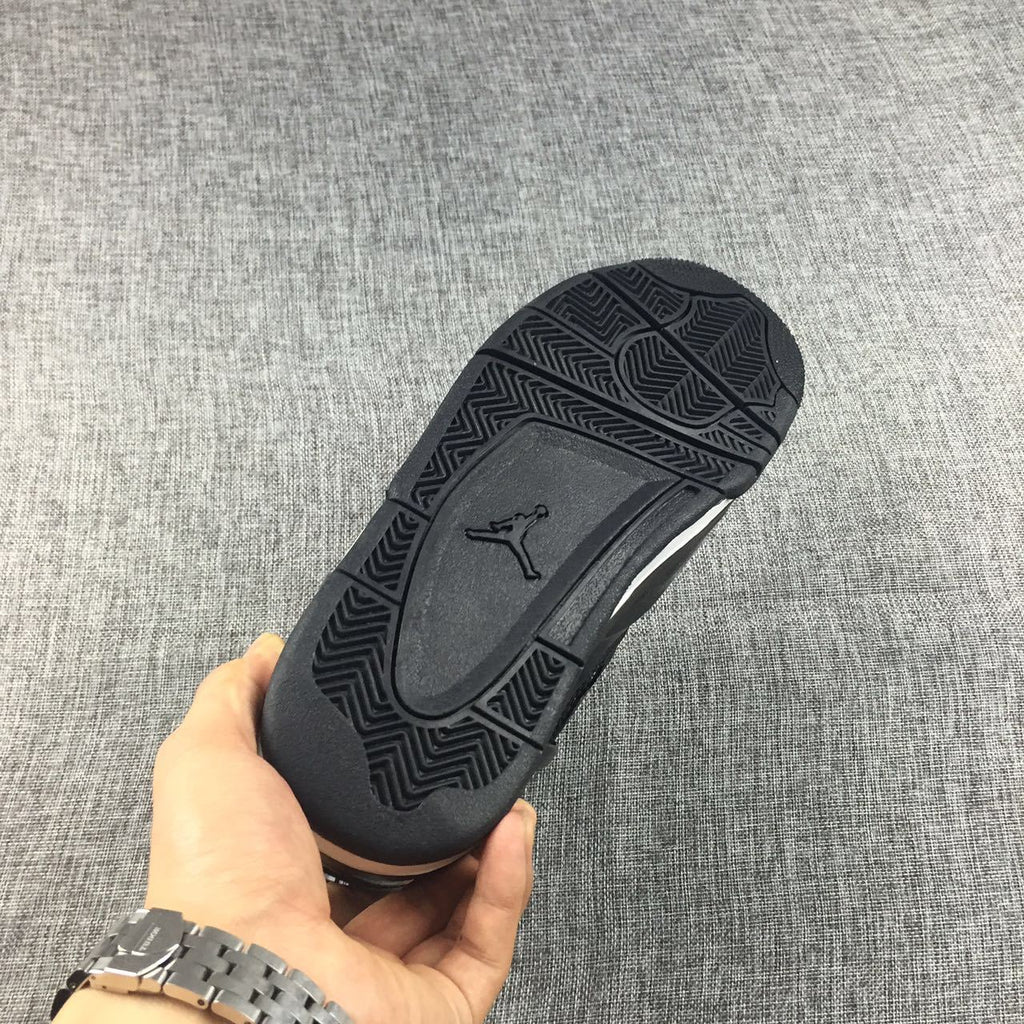 Air Jordan 4 Black Glossy Sneakers - product image from the listing.