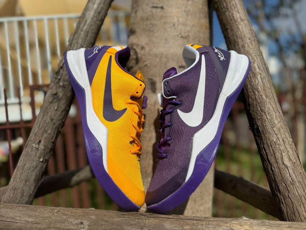 Nike Kobe 8 LSU Away Basketball Shoes, in Purple and Gold - product image from the listing.