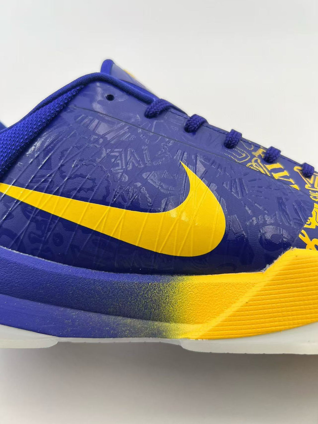 Nike Kobe 5 Protro Basketball Shoes in Blue Gold CD4991-400 - product image from the listing.