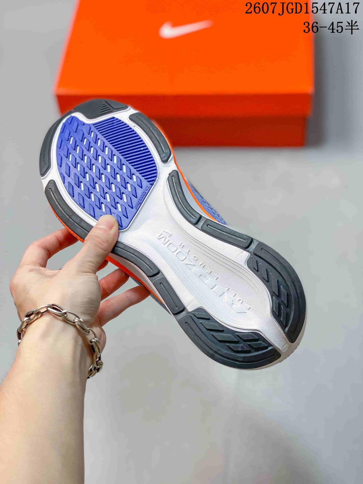 Nike Air Zoom Pegasus 42 Running Shoes in White Blue Orange - product image from the listing.