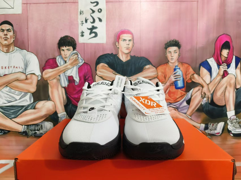 Nike Basketball Shoes in White and Black - product image from the listing.