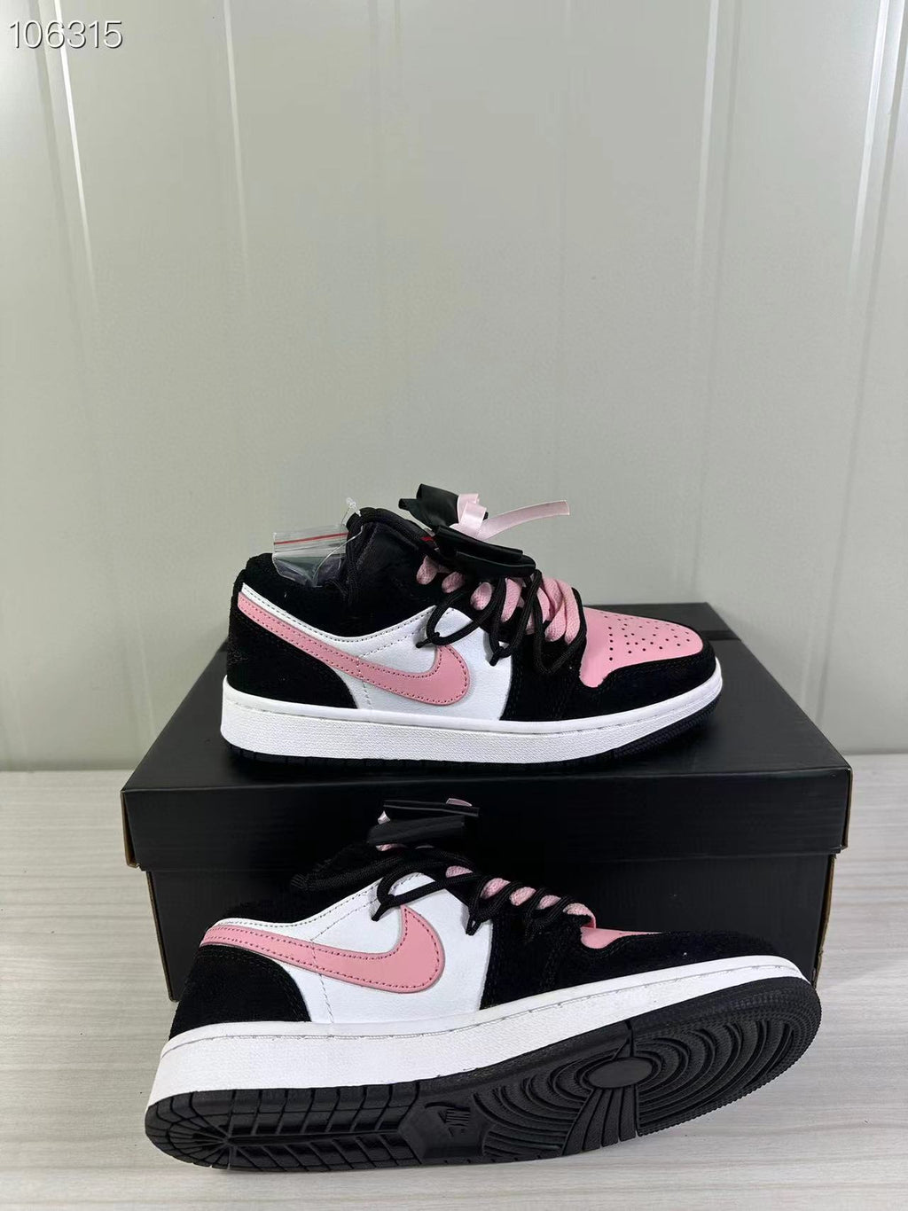 Air Jordan 1 Low GS Black Pink DX4374-008 - product image from the listing.
