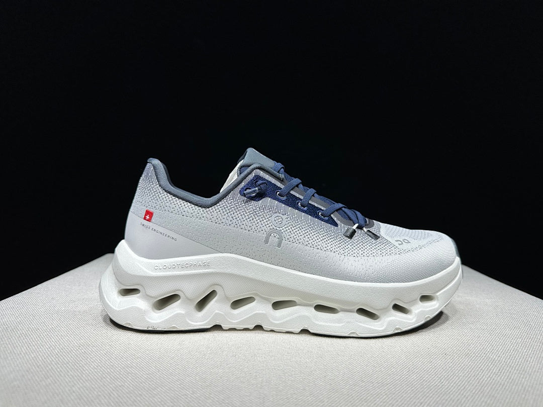 White and Navy On Cloudtilt Sneakers - product image from the listing.