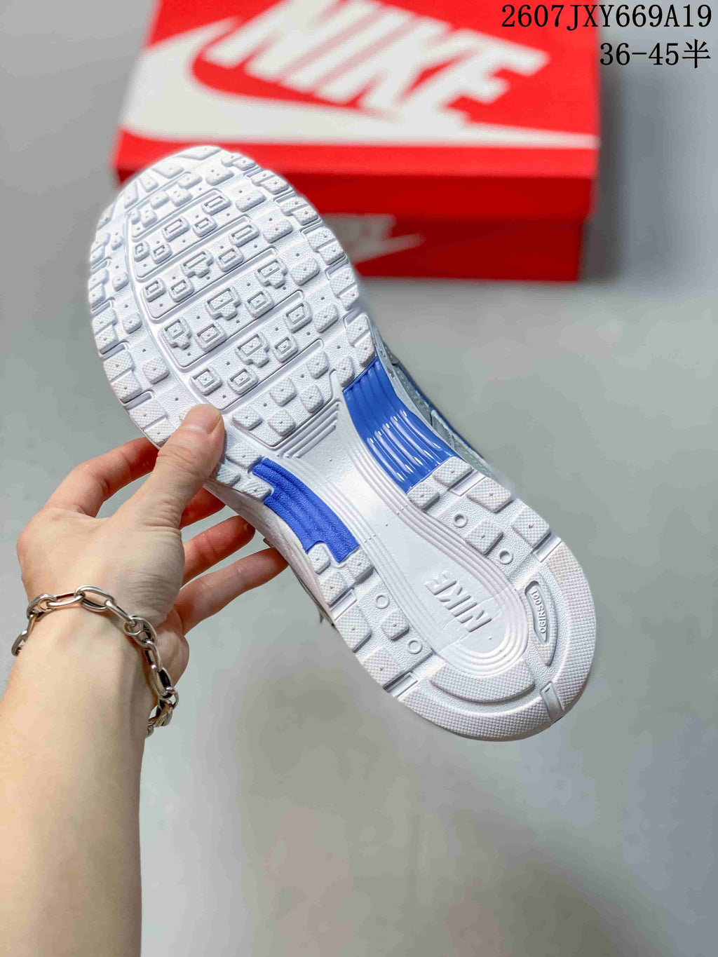 Nike P-6000 Retro Running Sneakers in White Grey Blue - product image from the listing.
