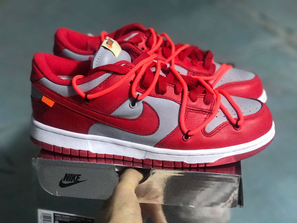 Nike Dunk Low LTHR / OW Sneakers in Red Gray CT0856-600 - product image from the listing.