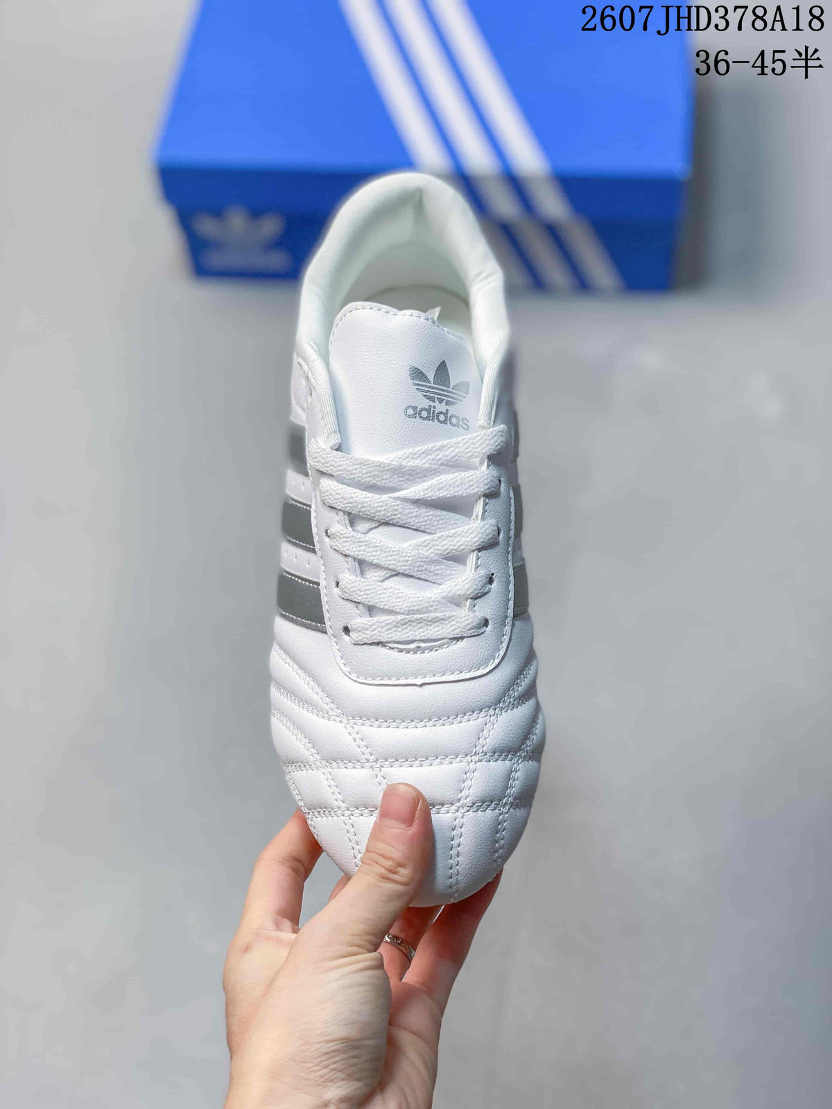 adidas Taekwondo SMIL-LS Low-Top Sneakers in White Silver - product image from the listing.