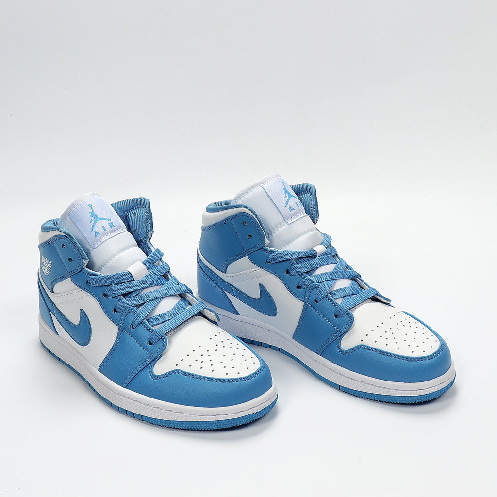 Air Jordan High-Top Sneakers University Blue White 554724-106 - product image from the listing.