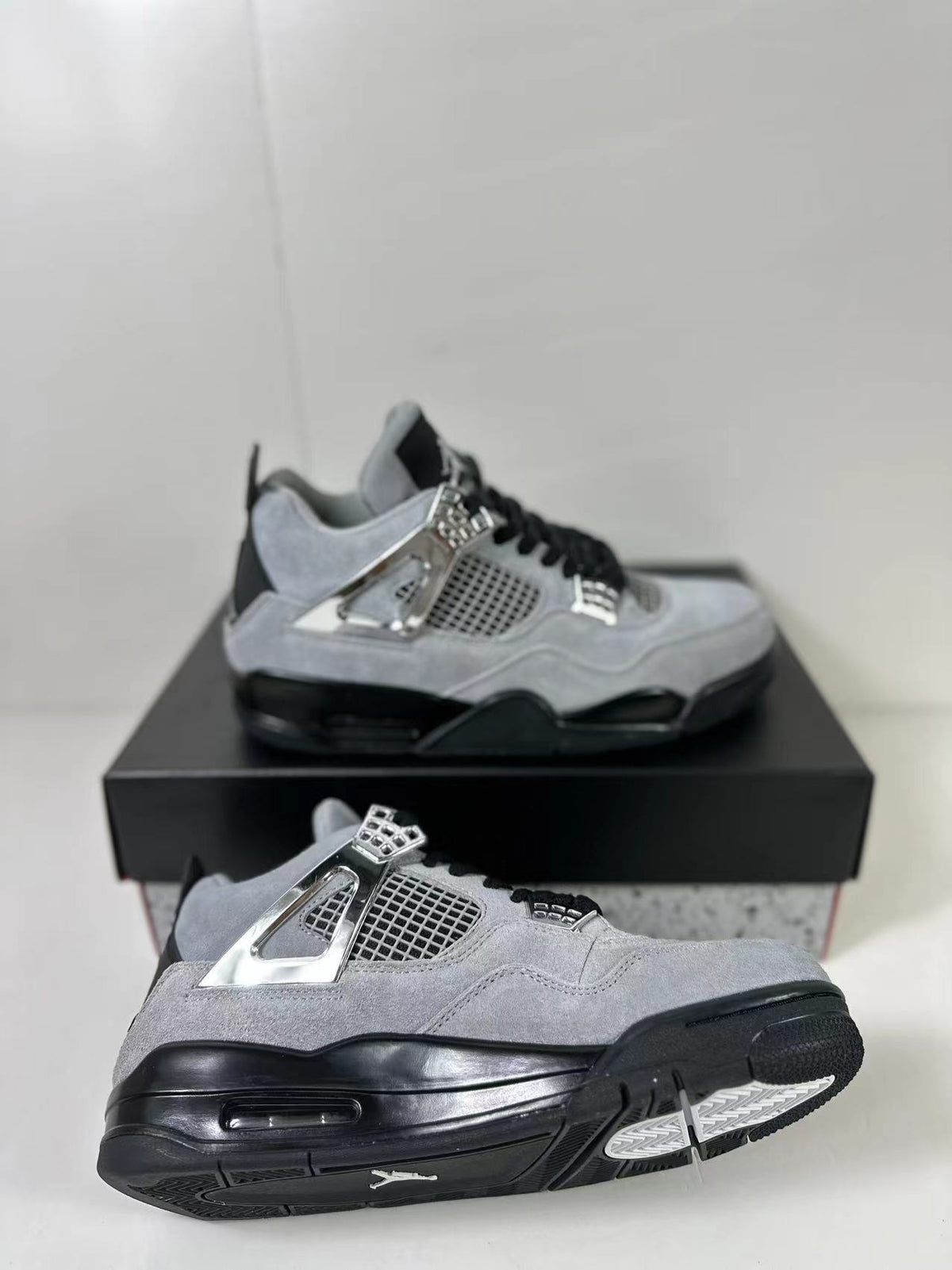 Air Jordan 4 Retro Gray Black Sneakers AQ9129-005 - product image from the listing.