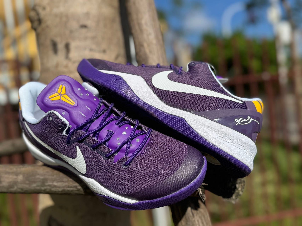 Nike Kobe 8 LSU Away Basketball Shoes, in Purple and Gold - product image from the listing.