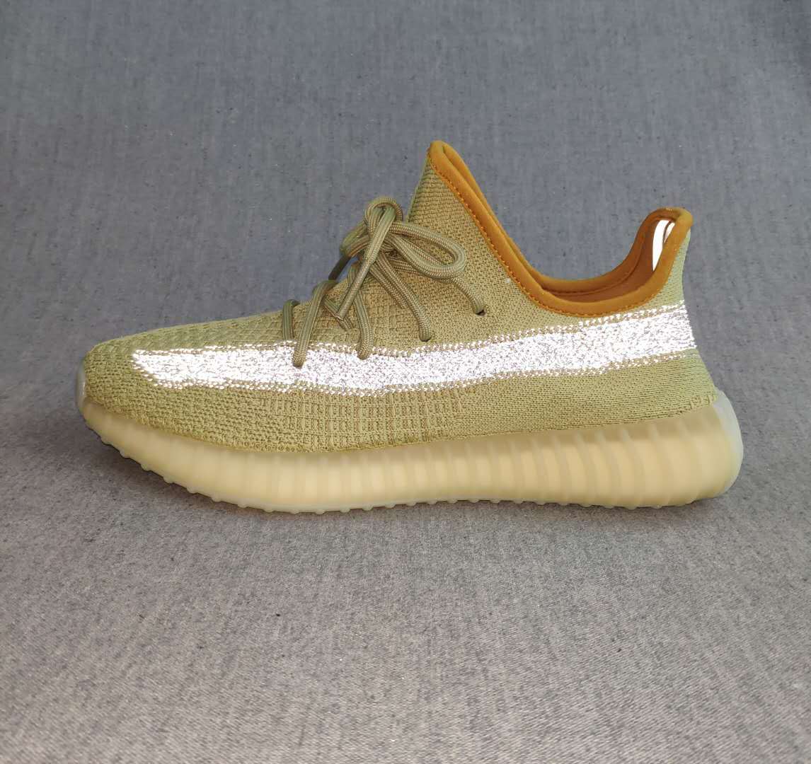Yeezy 350 V2 Static Reflective Sneakers in Green - product image from the listing.