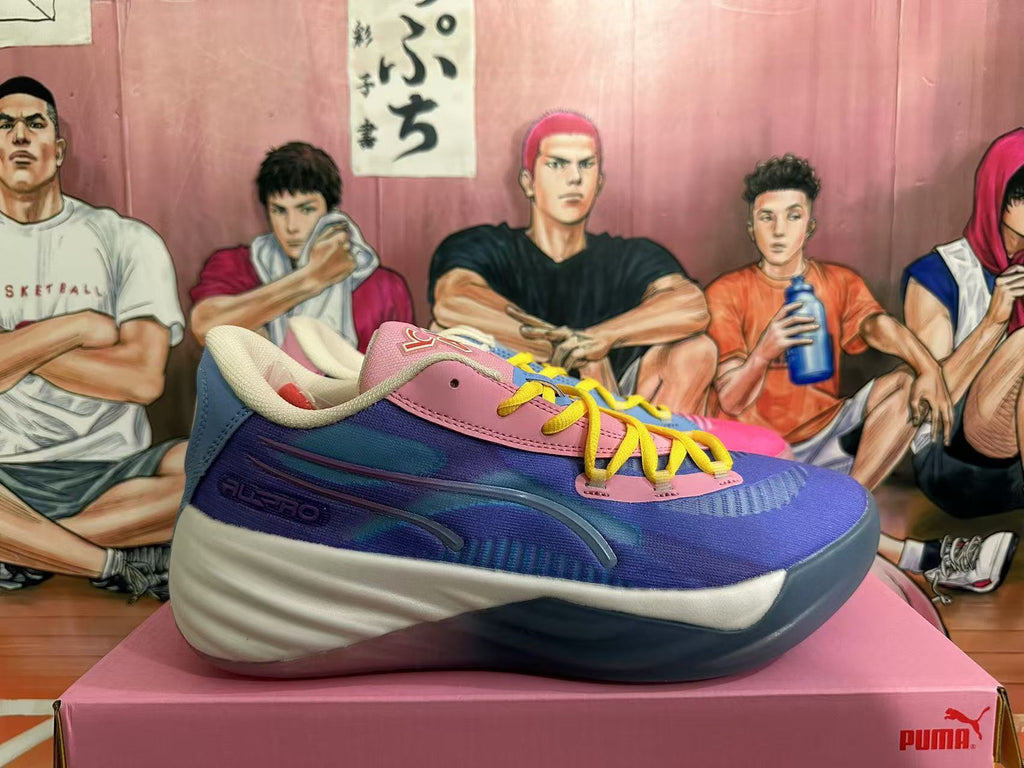 PUMA All-Pro NITRO Basketball Shoes in Pink Blue Yellow - product image from the listing.
