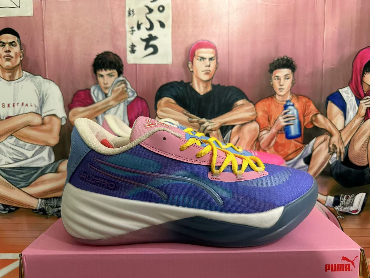 PUMA All-Pro NITRO Basketball Shoes in Pink Blue Yellow - product image from the listing.