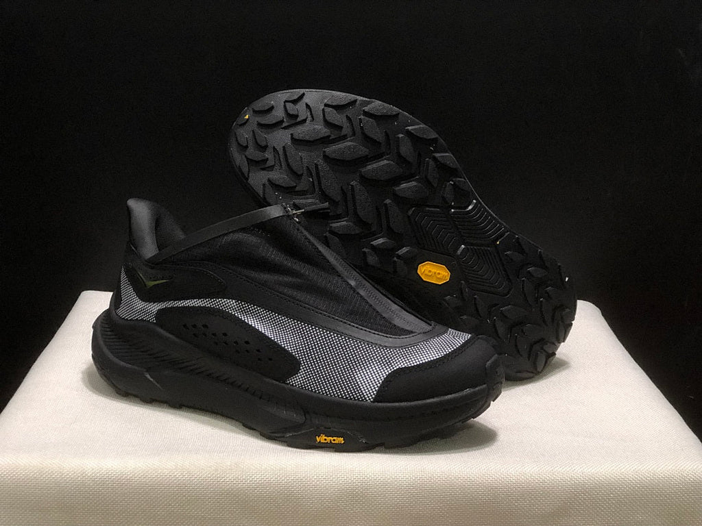 Black HOKA Project Transport Zip Sneakers - product image from the listing.