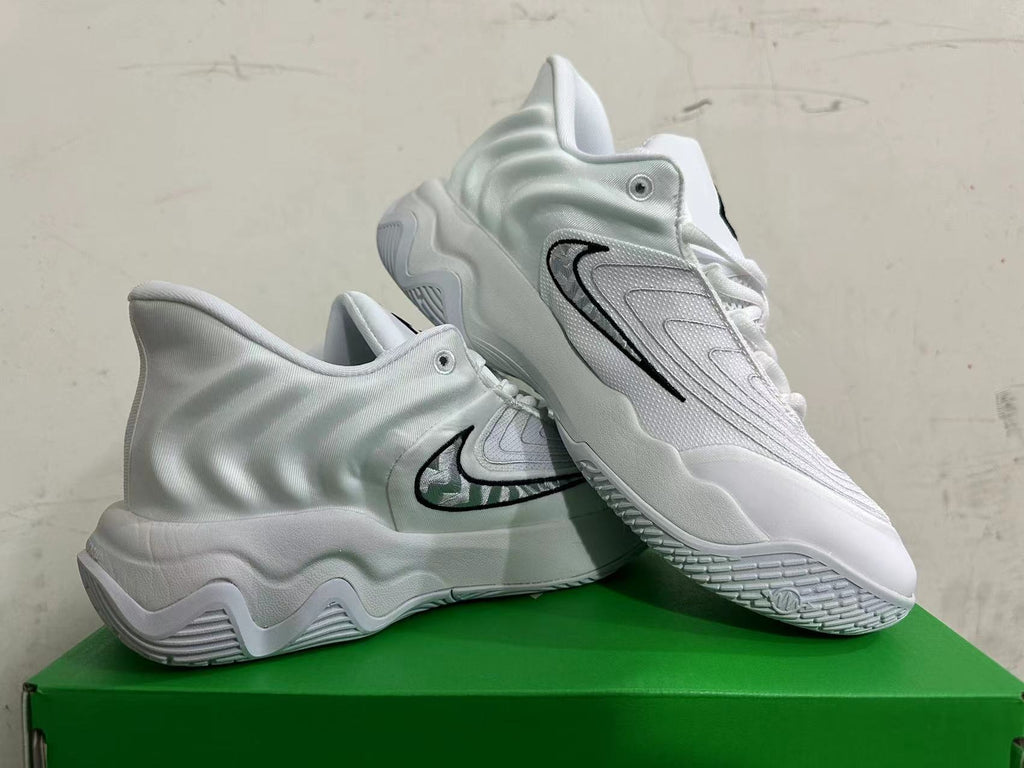 Nike White and Grey Basketball Trainers with Black Accents - product image from the listing.