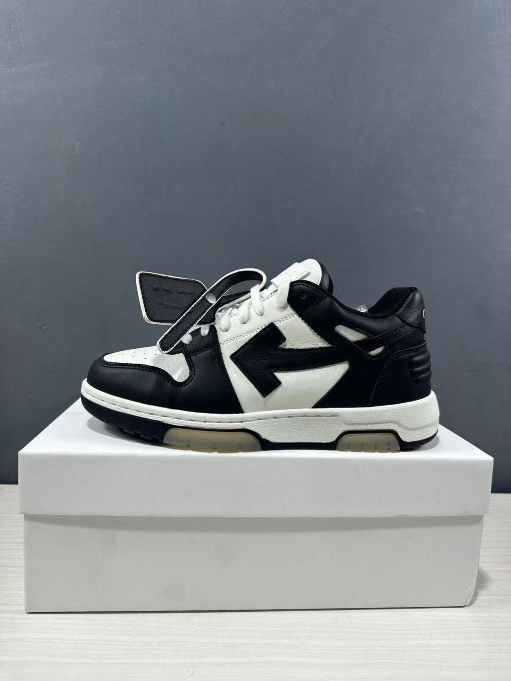 Off-White Out Of Office Low-Top Sneakers in Black White OMAI89C99LEA0070110 - product image from the listing.