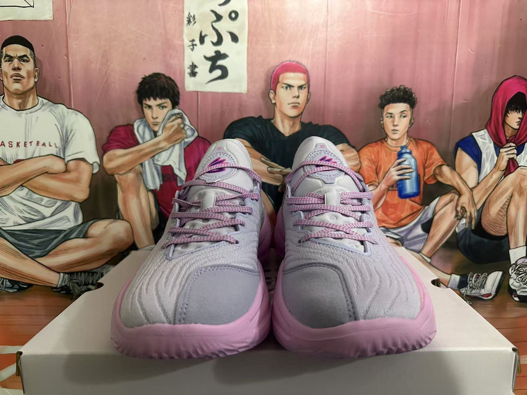 Gray and Pink Nike Kyrie Low Basketball Shoes - product image from the listing.
