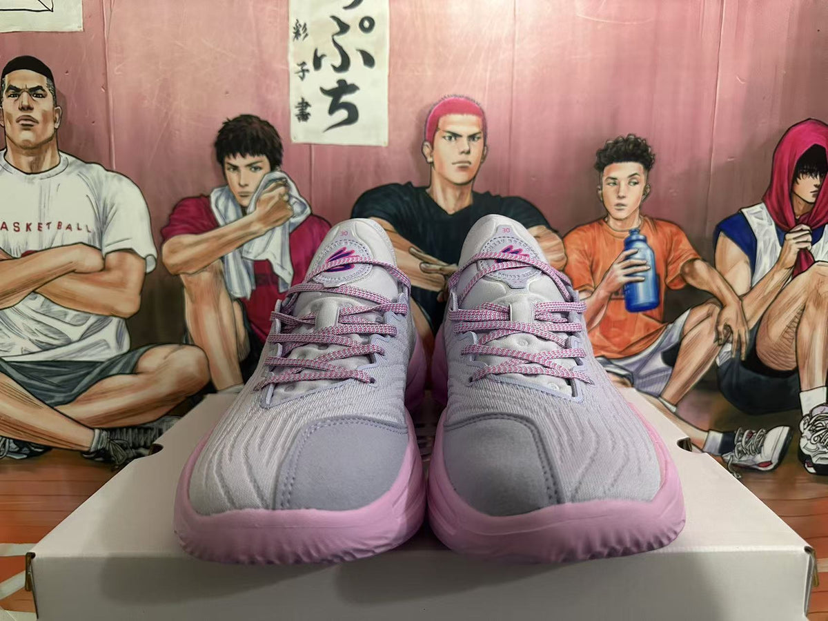 Gray and Pink Nike Kyrie Low Basketball Shoes - product image from the listing.
