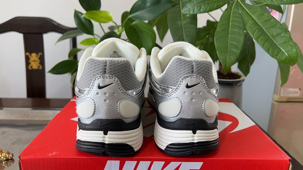 Nike P-6000 Sneakers in White Gray Black CN0149-001 - product image from the listing.