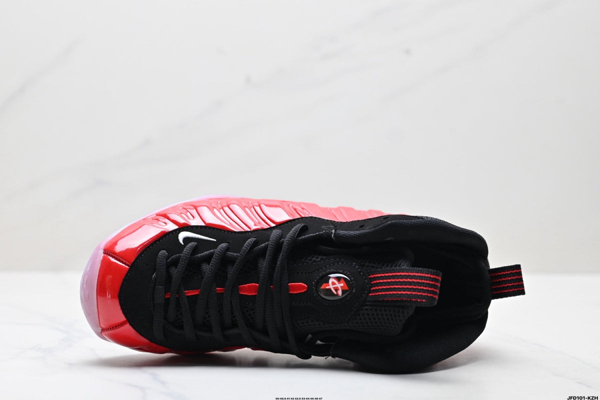 Nike Air Foamposite One Basketball Sneakers in Red and Black - product image from the listing.