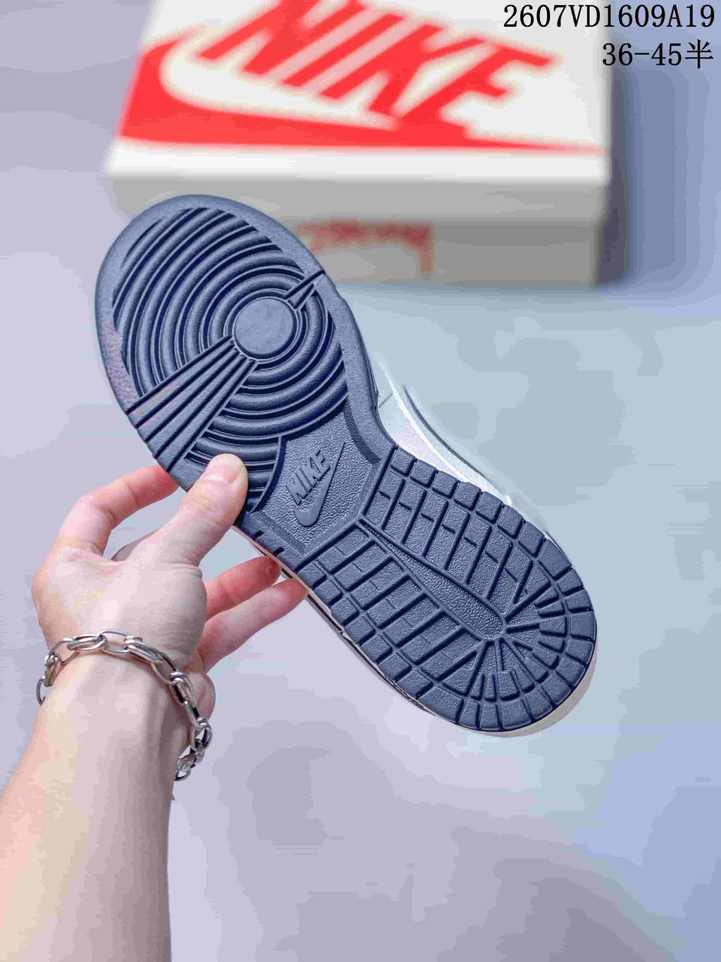 Nike Dunk Low Retro Sneakers in White Navy 2607VD1609A19 - product image from the listing.