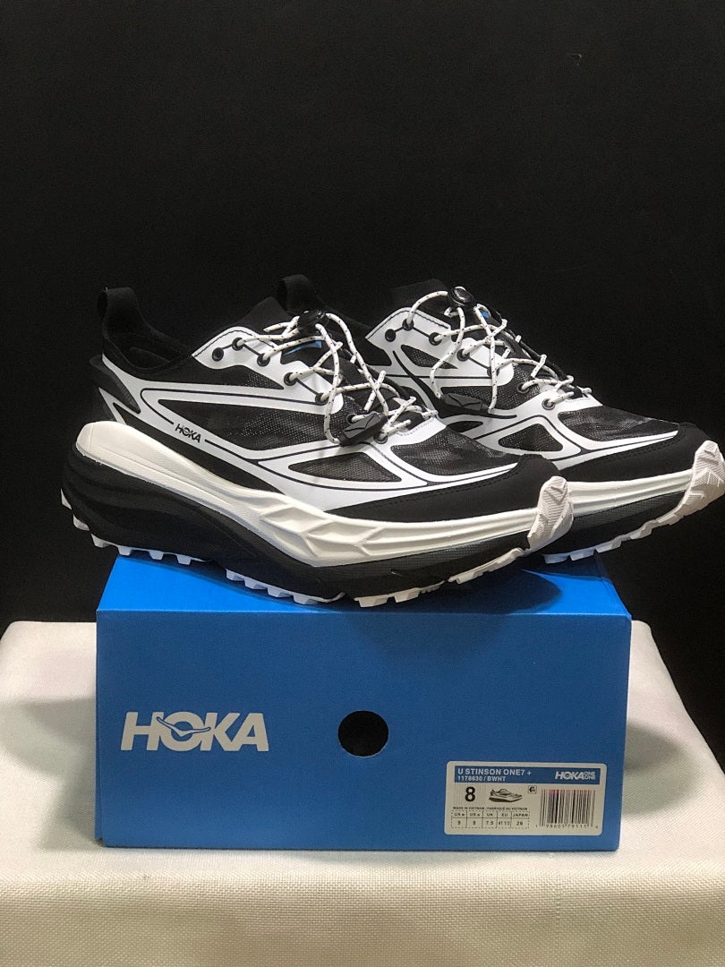 HOKA Stinson One 7 Black and White Trail Trainers - product image from the listing.