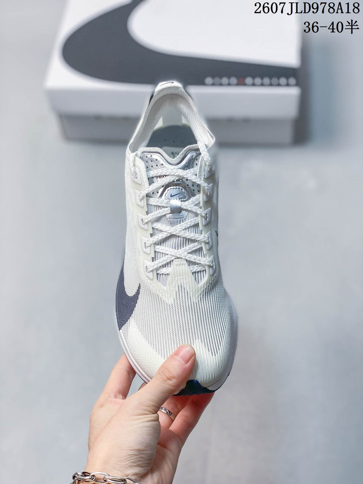 Nike ZoomX Vaporfly NEXT% 4 Running Shoes in White - product image from the listing.
