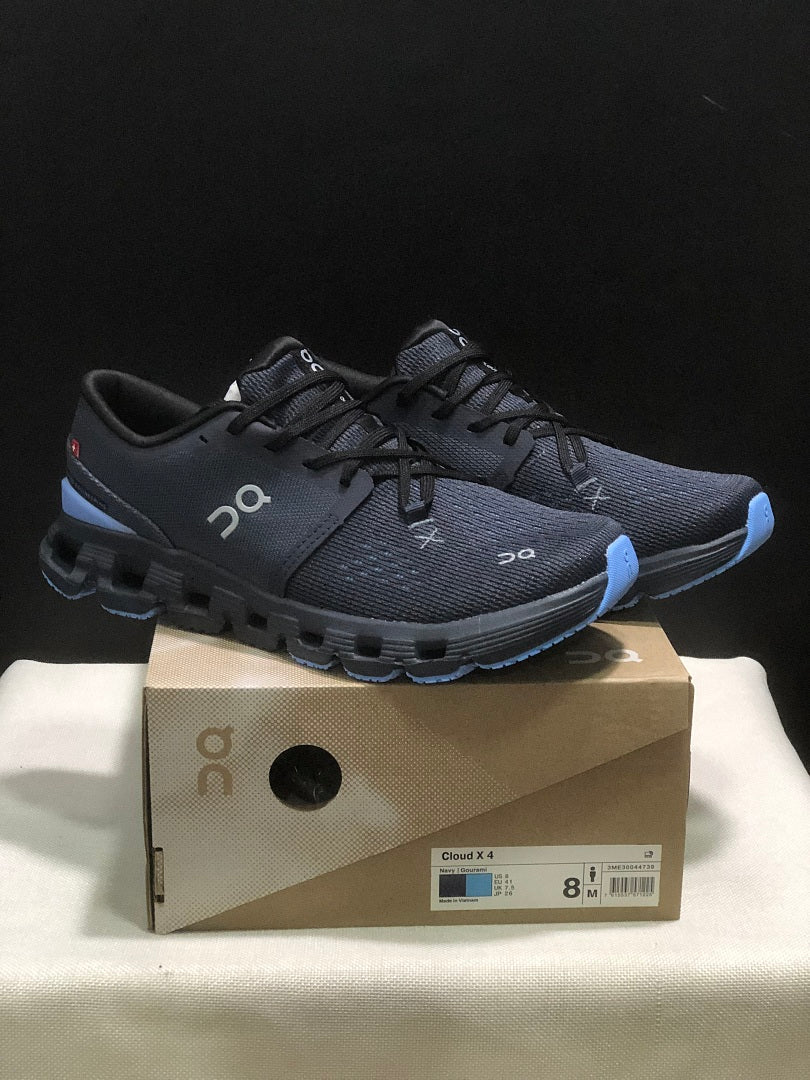 On Cloud X 4 Running Sneakers in Navy - product image from the listing.